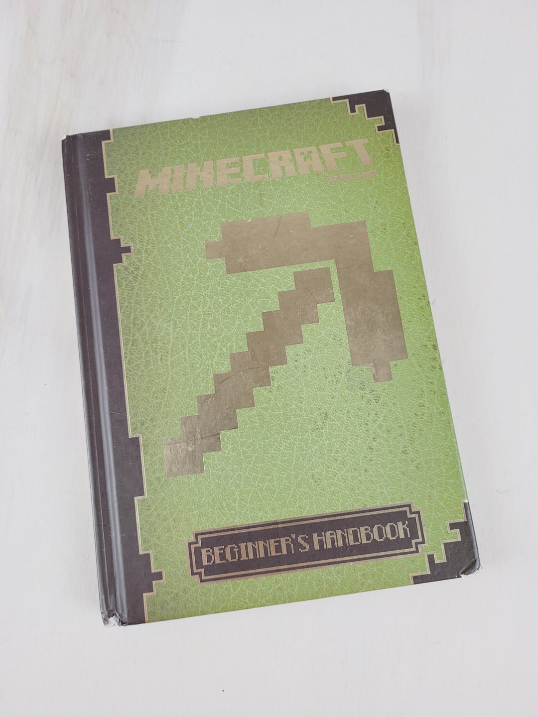 MINECRAFT BEGINNER'S HANDBOOK HARDCOVER PRE-LOVED